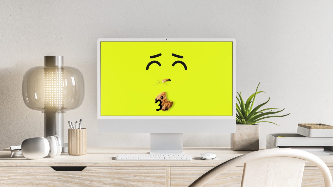 Ein Computer-Bildschirm isst einen Keks